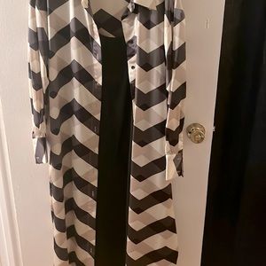 Dress set- one dress from Eloquii, plus three additional pieces.